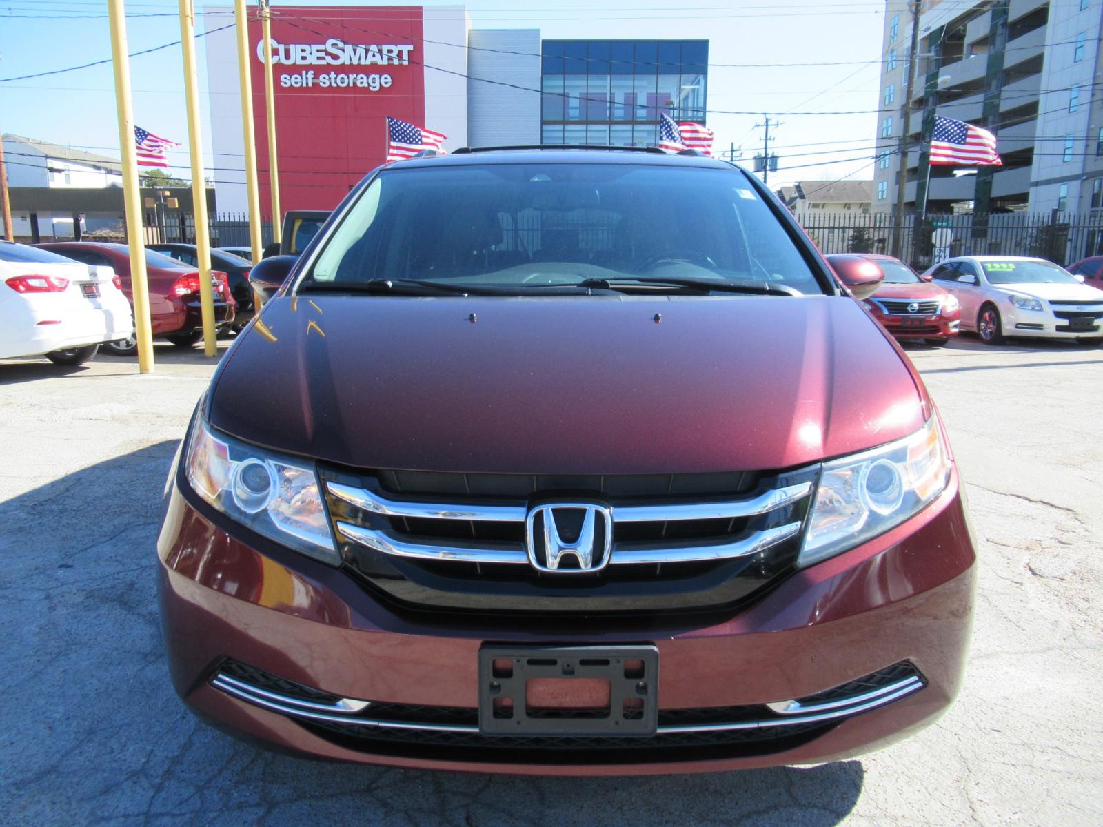 2016 Red /Tan Honda Odyssey EX-L (5FNRL5H62GB) with an 3.5L V6 SOHC 24V engine, Automatic transmission, located at 1511 North Shepherd Dr., Houston, TX, 77008, (281) 657-1221, 29.798361, -95.412560 - 2016 HONDA ODYSSEY EX-L VIN: 5FNRL5H62GB103369 5 F N R L 5 H 6 2 G B 1 0 3 3 6 9 VAN 3.5L V6 F SOHC 24V GASOLINE FRONT WHEEL DRIVE - Photo #33